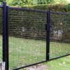 Dubbele tuinpoort met ronde palen – gelast gaas 50×50