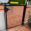 Enkele tuinpoort met ronde palen – gelast gaas 50×50
